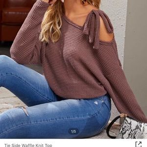 Off the shoulder “bow tieing” light sweater